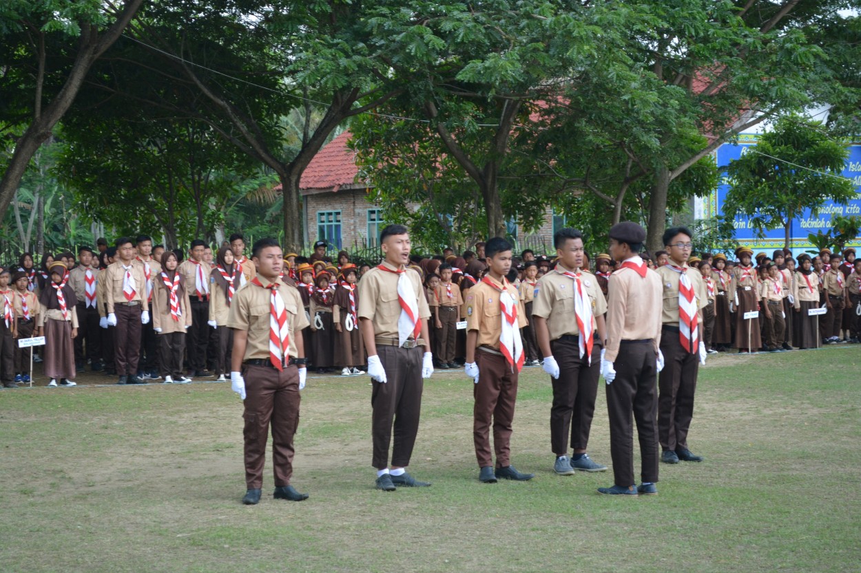 laporan-kompi-upacara-pembukaan-kemah-bersama-tingkat-madrasah-ibtidaiyah-se-kkm-min-3-pandeglang-di-ponpes-an-nahl-darunnajah-5-cikeusik-pandeglang-banten